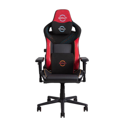 Der Spawn Gaming Stuhl "Dragon" von Spawn ist ein schwarz-roter Stuhl mit hoher Rückenlehne, ergonomischem Design, 4D-Armlehnen, Kopfstütze mit Spawn-Logo, Lendenwirbelstütze und einem stabilen Fünf-Rad-Fuß.