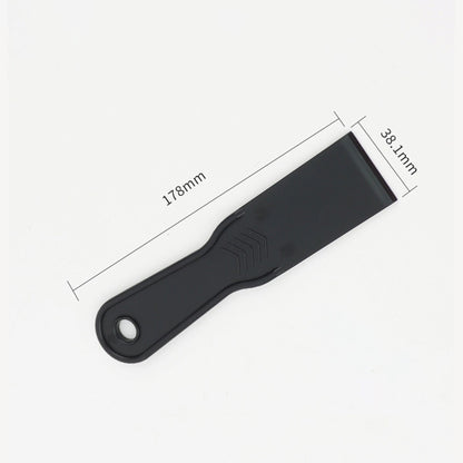 Ein schwarzer Kunststoffschaber aus dem HC Home & Living Kunststoffschaber 3er Set, mit einem Loch im Griff und den Maßen 178mm x 38,1mm, ist auf weißem Grund abgebildet - ideal als vielseitiger Haushaltsschaber.